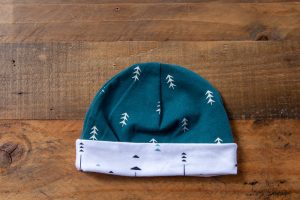 Green Hat with White Arrow Band